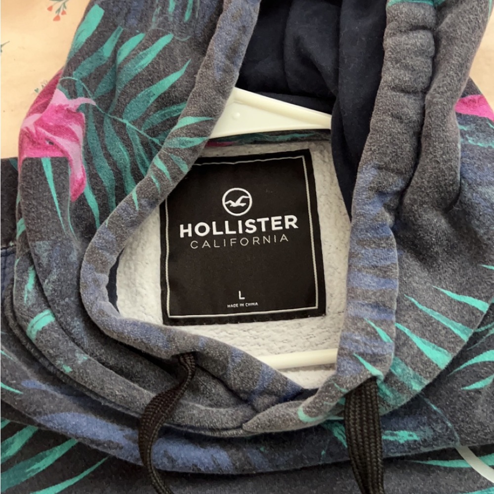 Holister Floral hoodie, size L, fits like a M